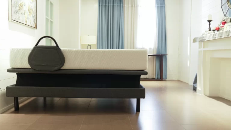 Ergomotion Ascend hi-low adjustable bed raised toward caregiver height with mattress lifted