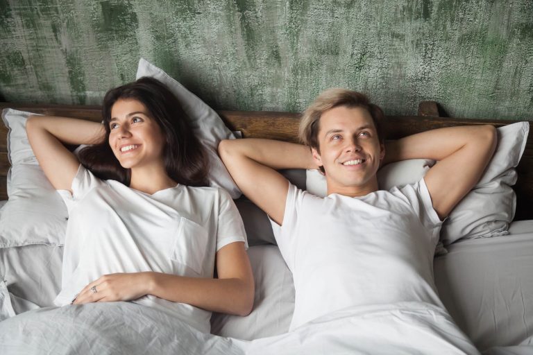 Couple sleeping comfortably on natural latex mattress