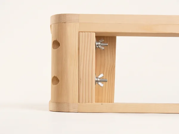 Heavy-duty foundation assembly step 9: Tighten the wing nuts by hand to close the joint.