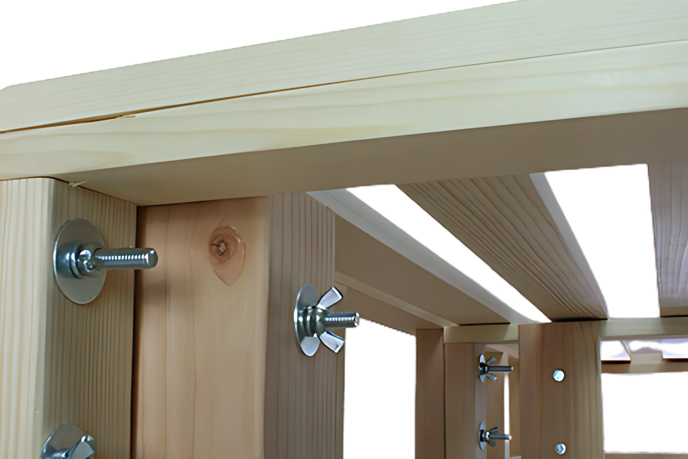 Underside of the heavy-duty foundation: corner posts joined to the rails with bolts and wing nuts, slats resting on the center rail