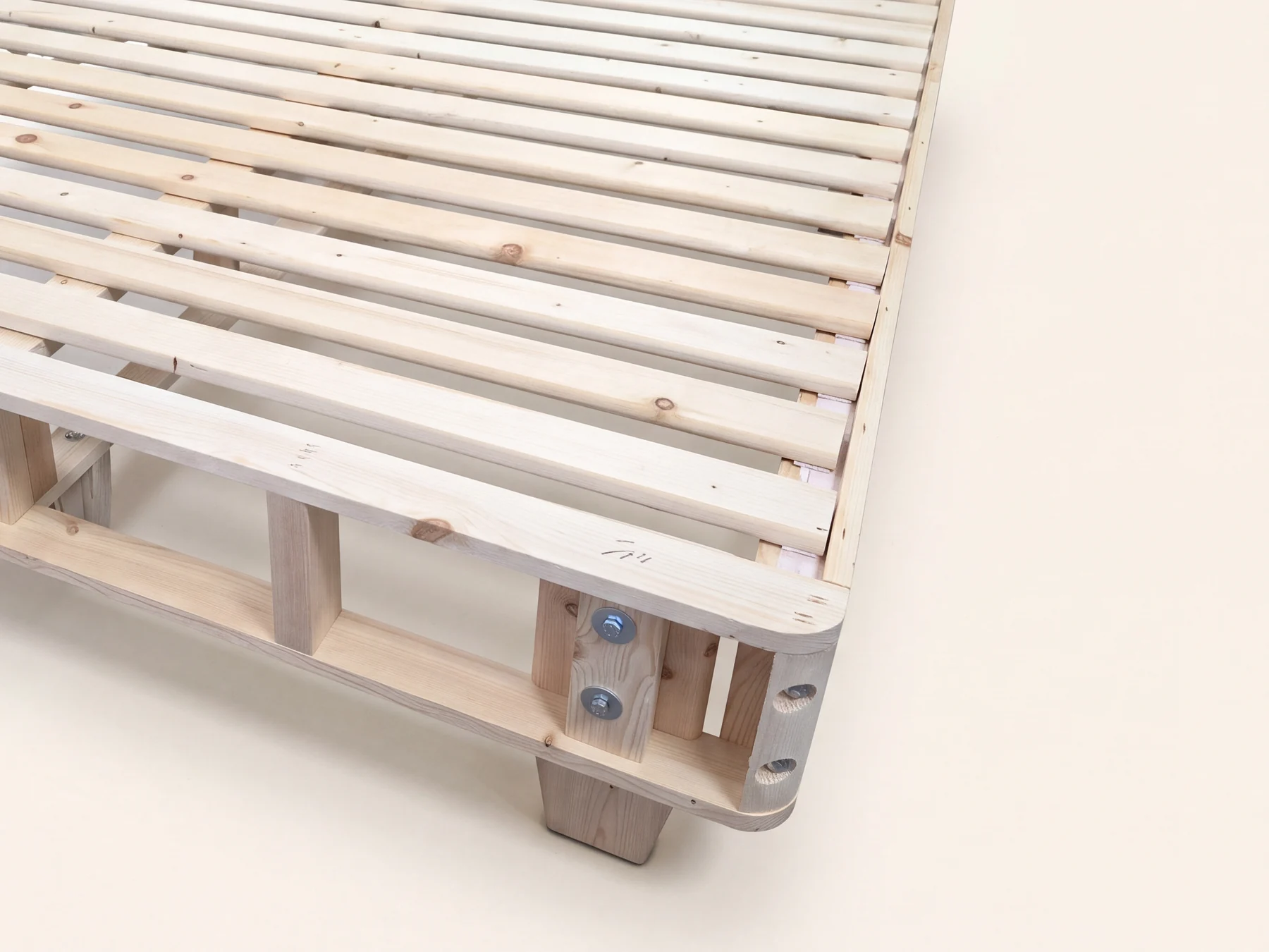 Close view of the solid spruce slats and rails on the heavy-duty foundation