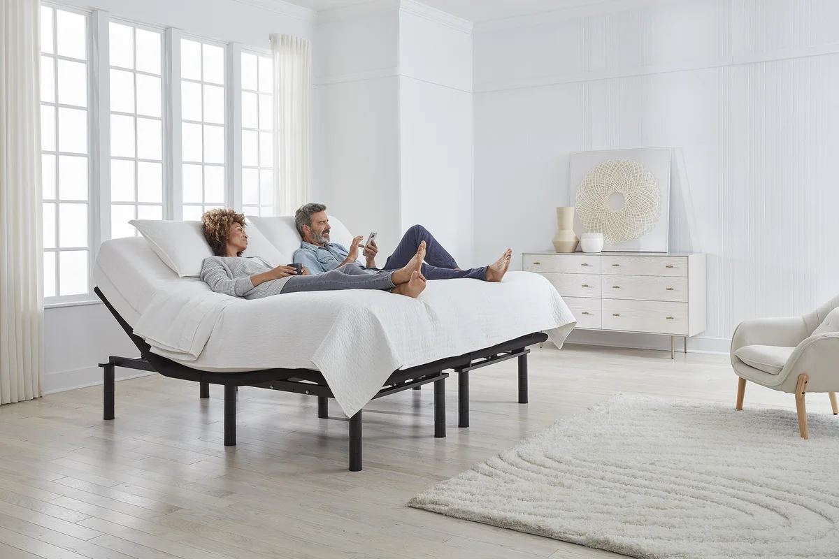 Split king adjustable bed with each side raised to a different position