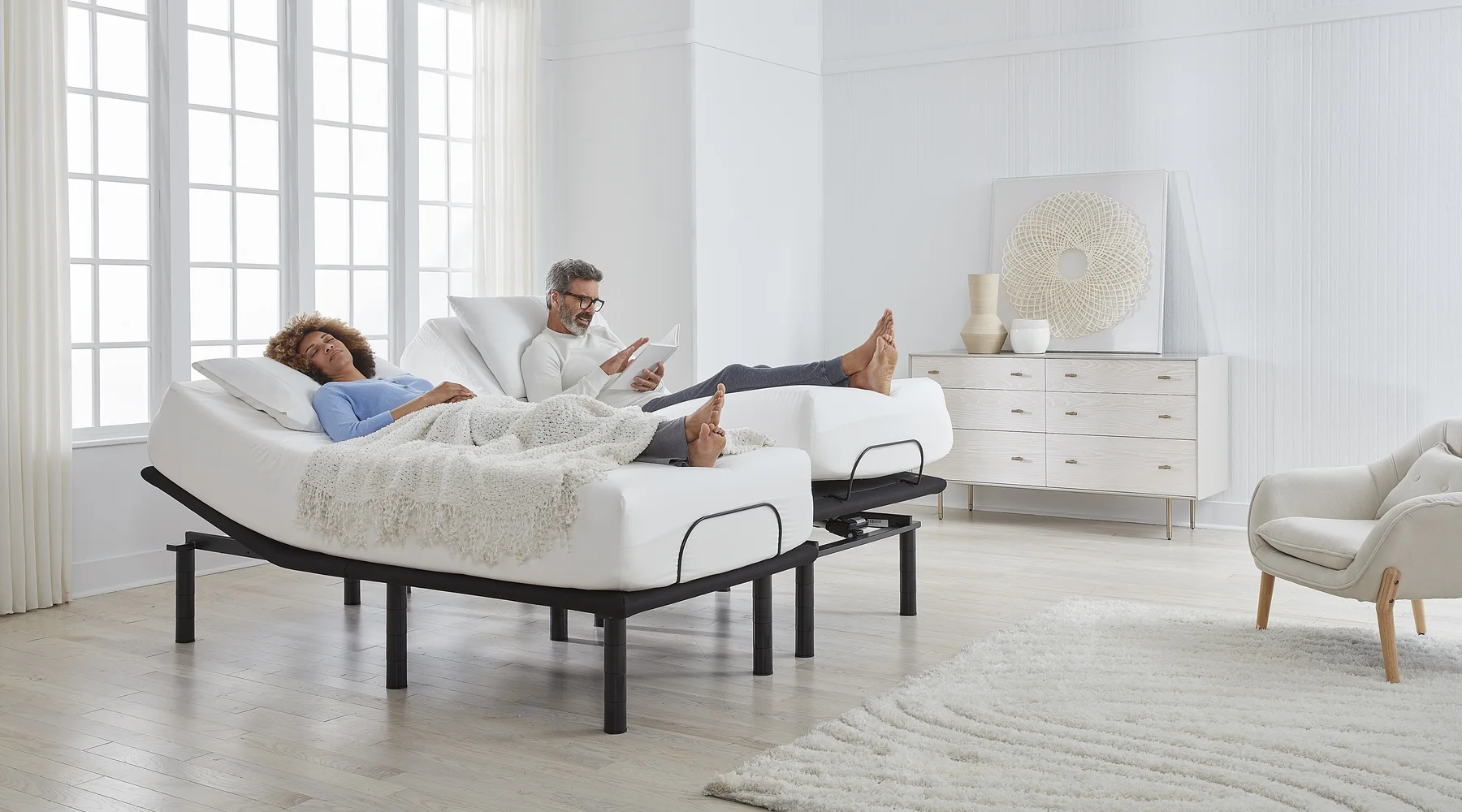 Couple on a split king adjustable bed, each side positioned independently