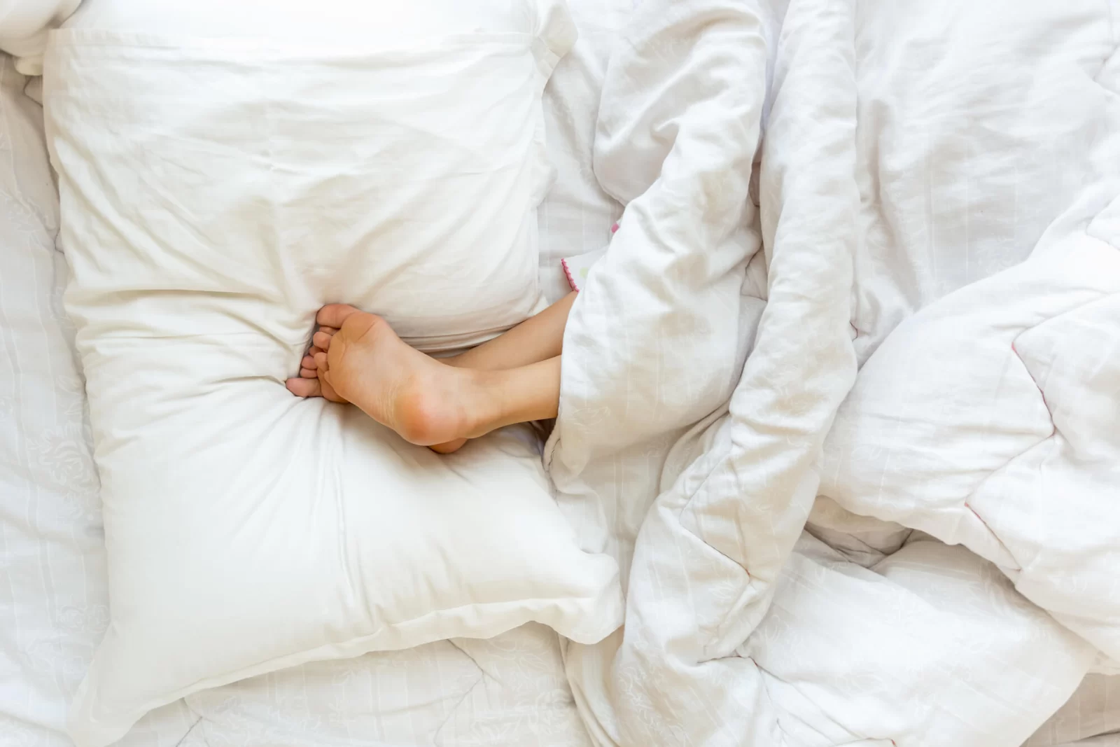 9 Benefits Of Sleeping With Your Legs Elevated