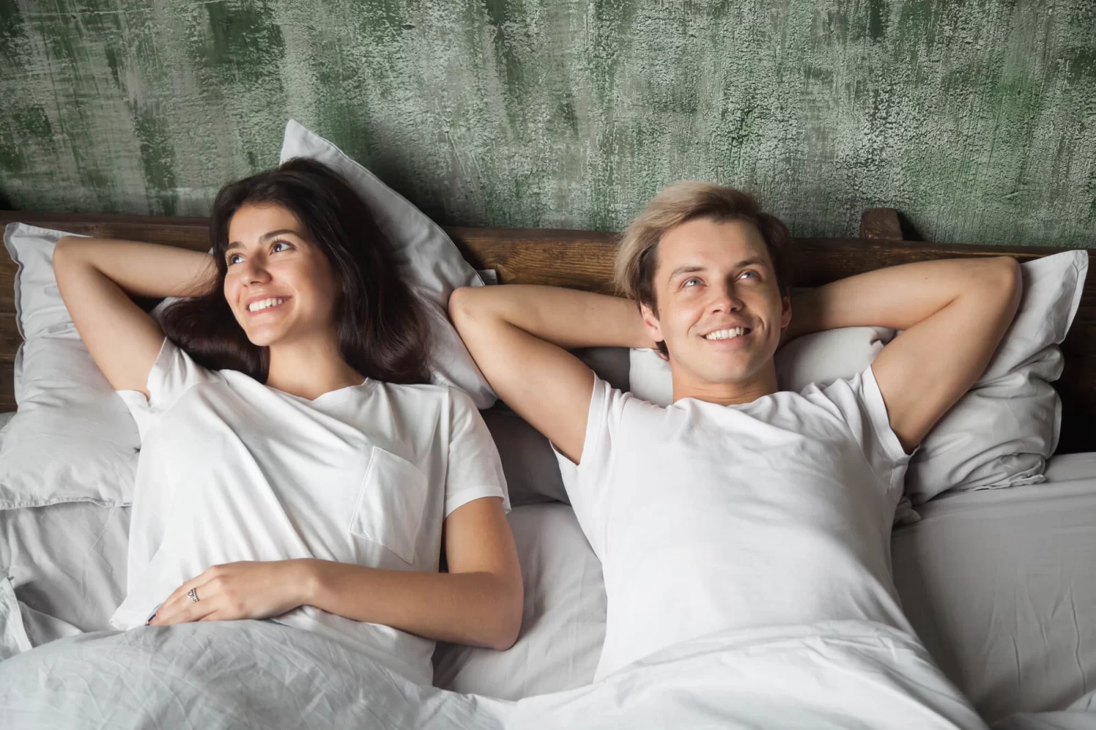 Couple sleeping comfortably on natural latex mattress