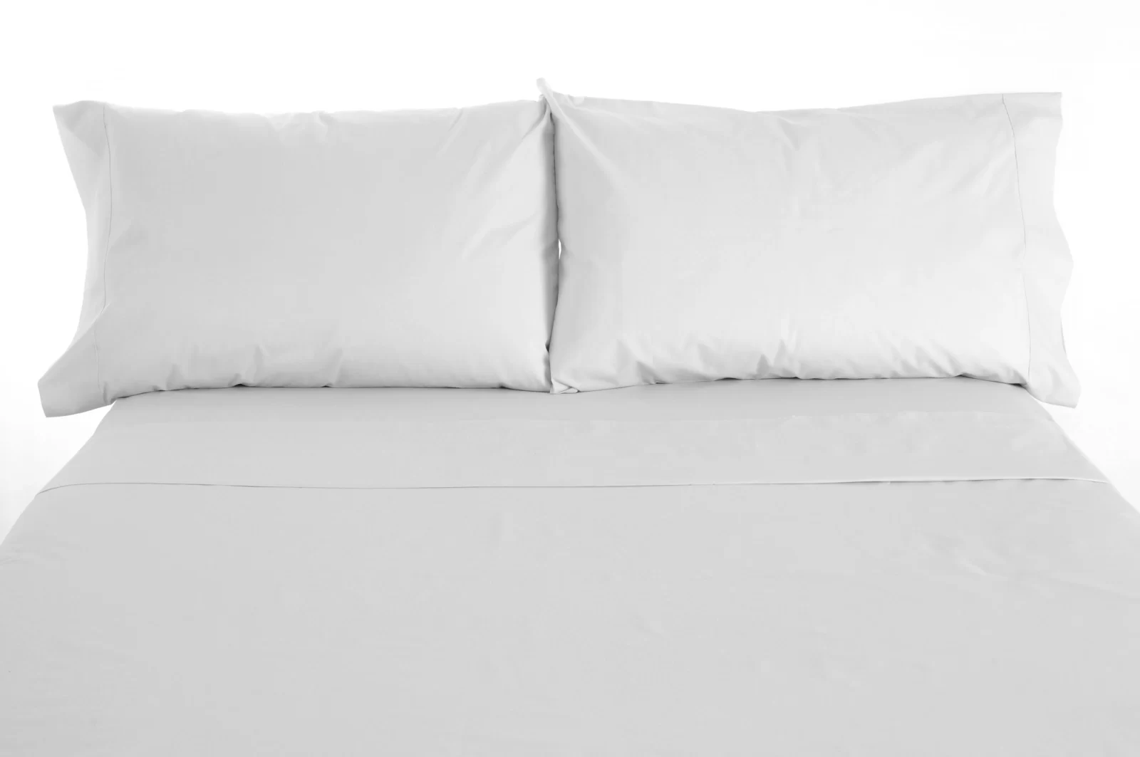 Coyuchi organic cotton percale sheet collection in white